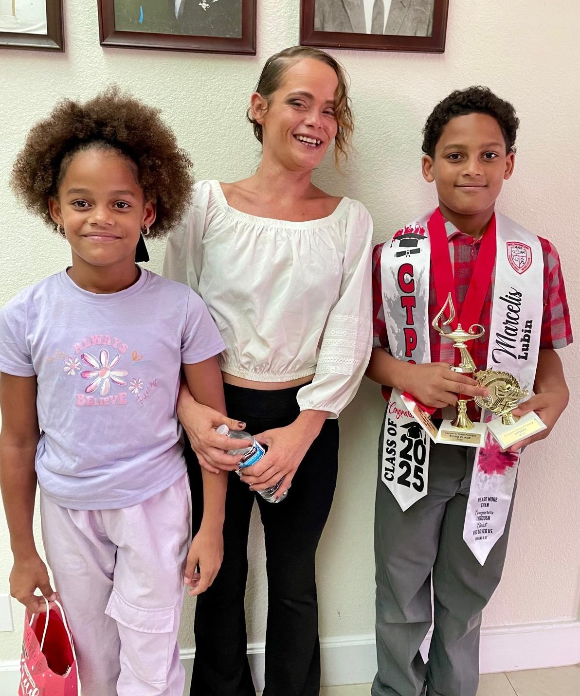 Rhonda L.C. Hull's grandson's primary school graduation, with his mother Erinlee