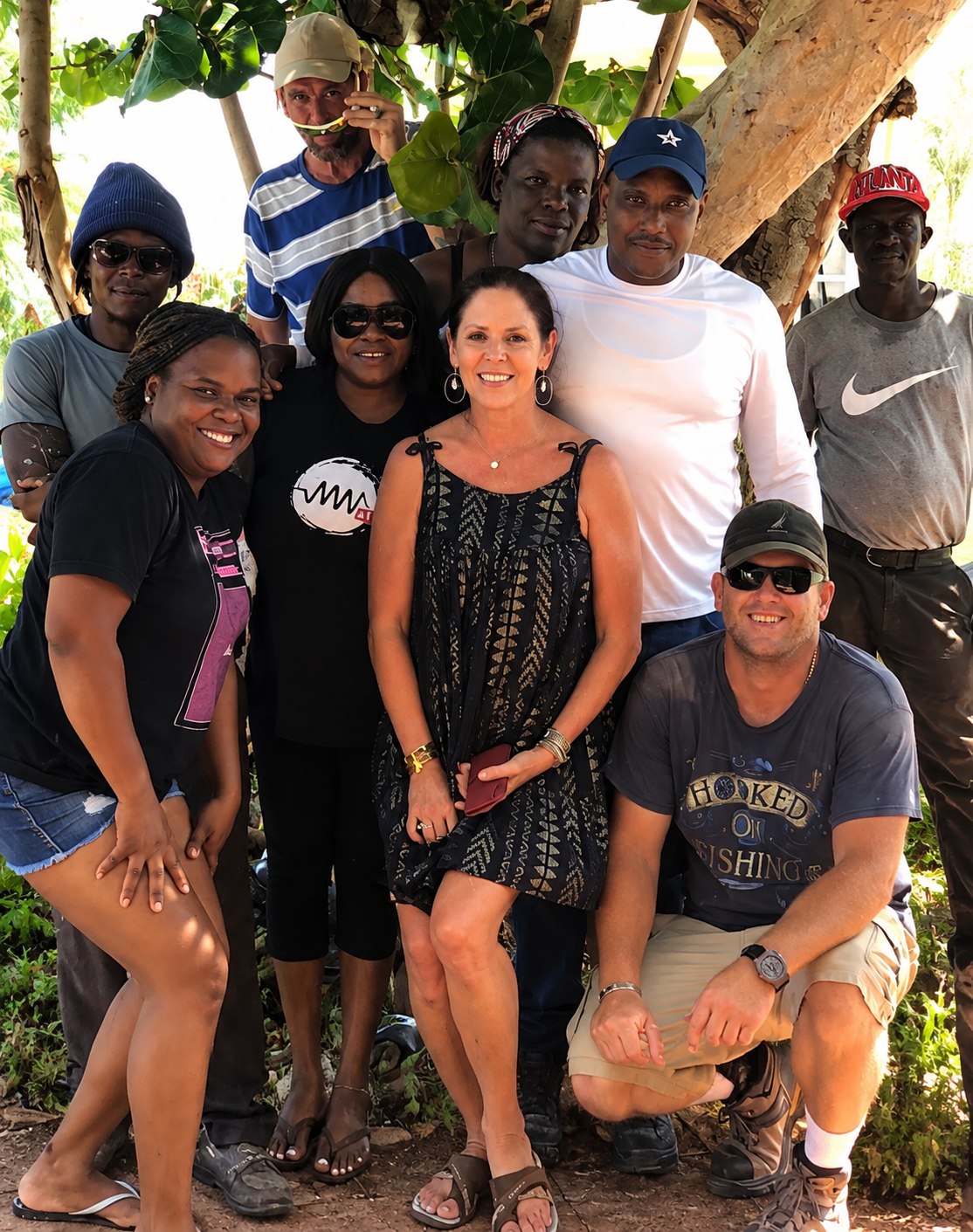Rhonda L.C. Hull with her HULLdev team, gathered together outdoors