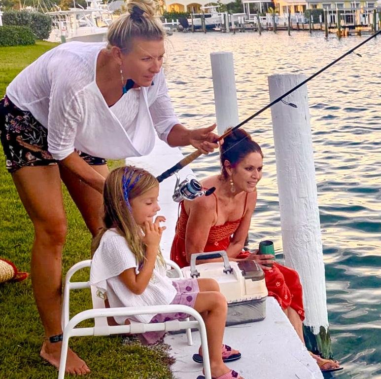 Rhonda L.C. Hull fishing with nieces, nephews and grandchildren