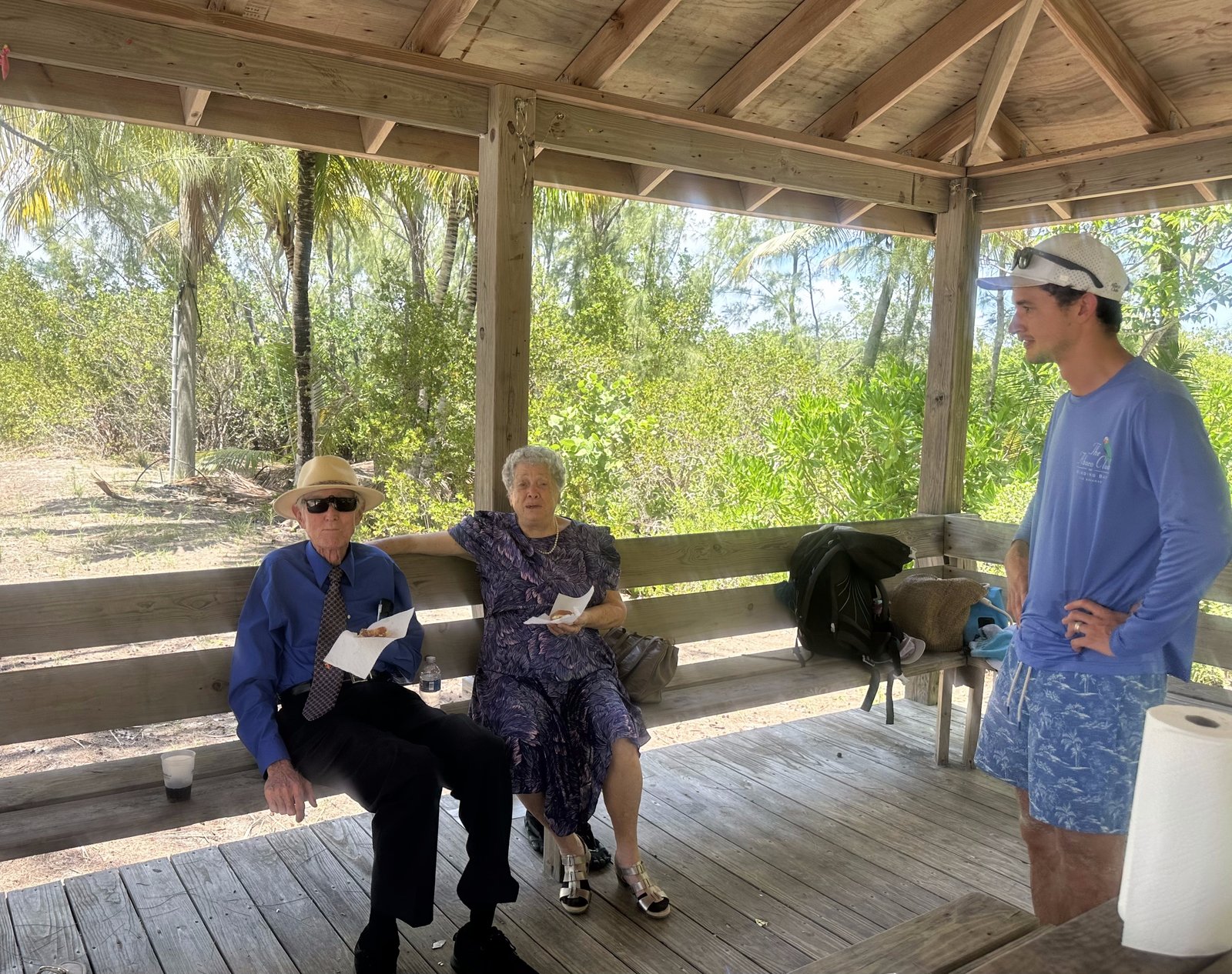 Rhonda L.C. Hull's parents at Cherokee Sound, with family gathered around them